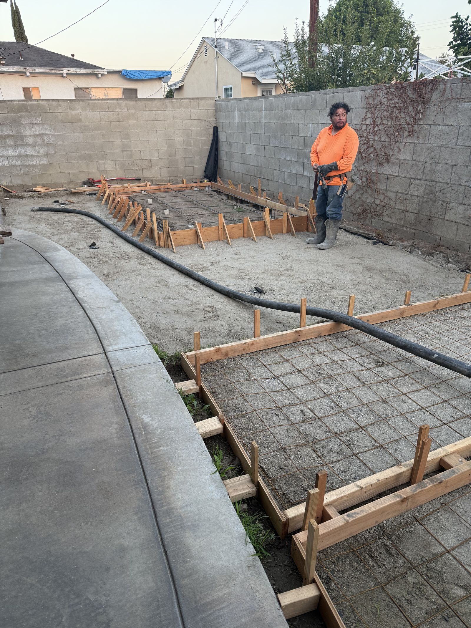 Custom concrete retaining wall under construction